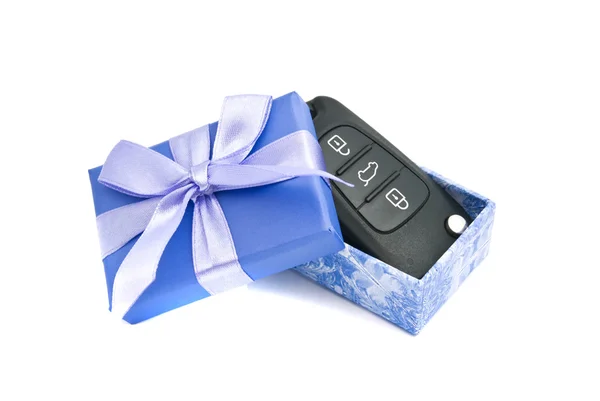 Car keys in blue gift box on white — Stock Photo, Image