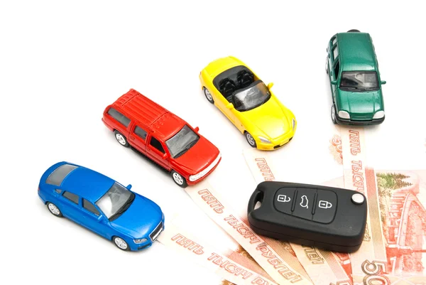 Four cars, keys and Russian banknotes — Stock Image Four cars, keys and Russian banknotes Stock Image