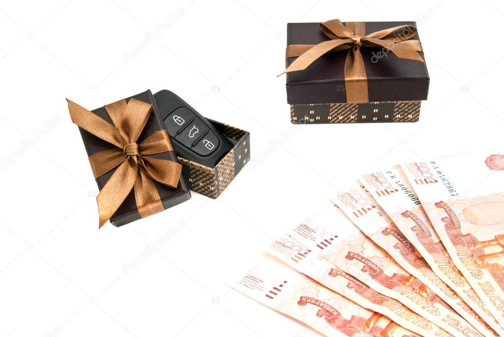 car keys, money and brown gift boxes