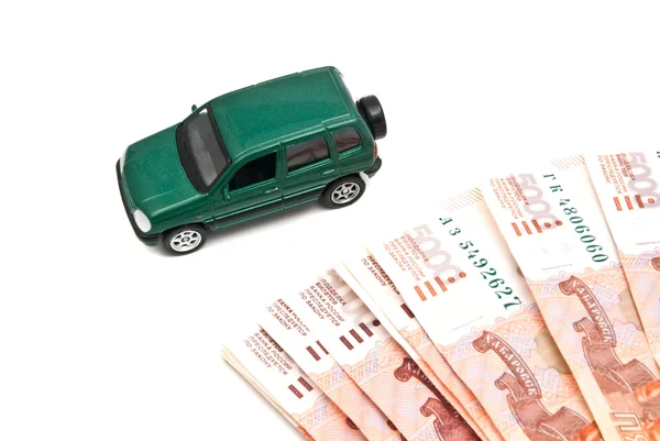 Grünes Auto und Banknoten — Stockfoto