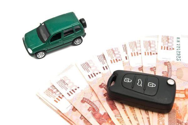 Green car, banknotes and keys — Stock Photo, Image