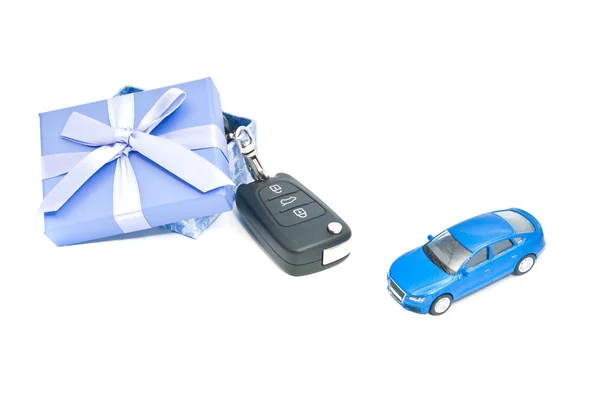 Gift box, blue car and keys — Stock Photo, Image