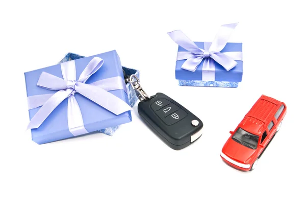 Two gift boxes, car and keys — Stock Photo, Image