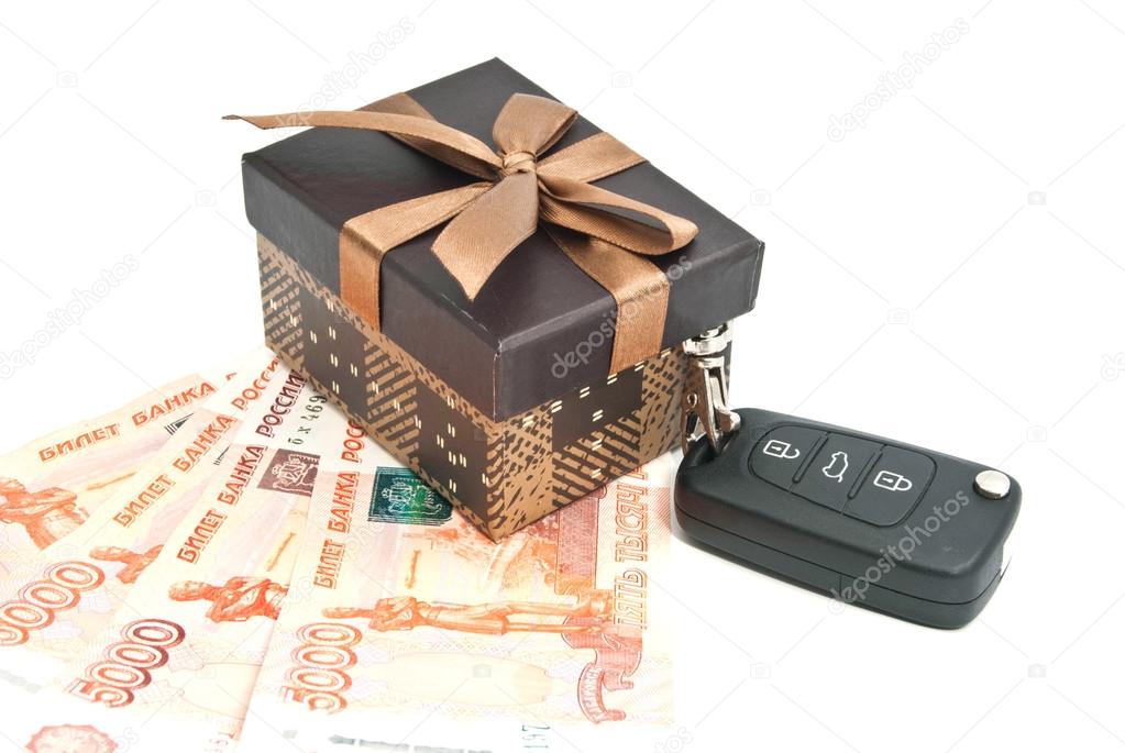 brown gift box, keys and banknotes