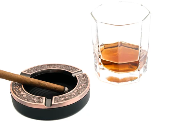 Cigarillo in metal ashtray and alcohol — Stock Photo, Image