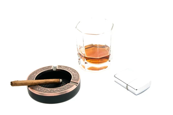 Lighter, cigarillo in ashtray and whiskey — Stock Photo, Image