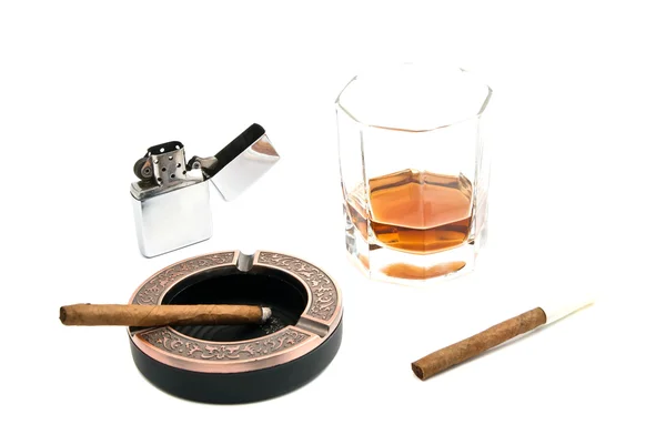 Two cigarillos, ashtray, lighter and glass of whiskey — Stock Photo, Image