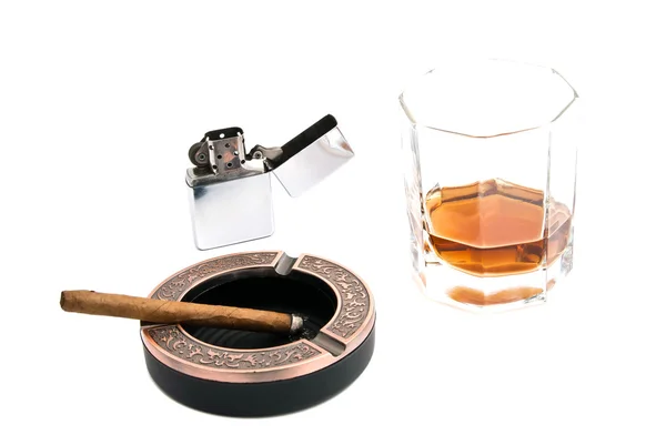 Cigarillo in ashtray and whiskey on white — Stock Photo, Image
