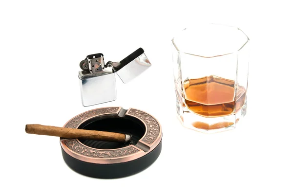 Cigarillo in ashtray and alcohol — Stock Photo, Image