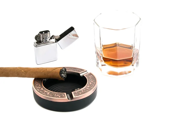 Cigar in ashtray and glass of whiskey — Stock Photo, Image