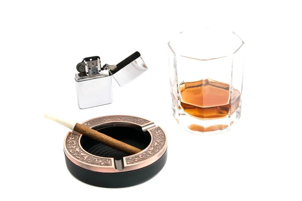 Cigarillo in ashtray and whiskey — Stock Photo, Image