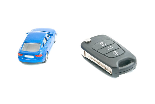 car keys and blue car 