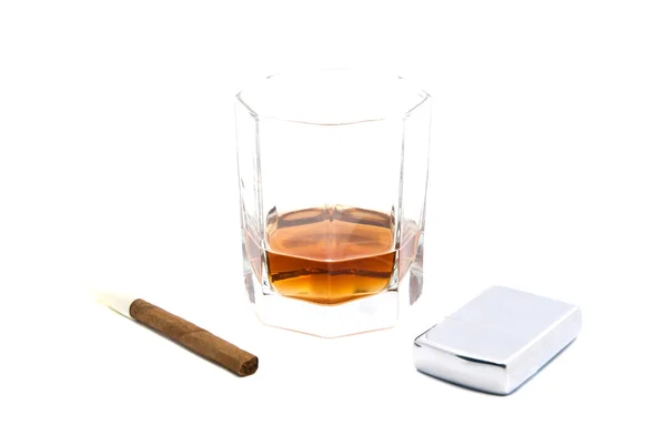 Cigarillo, lighter and glass of cognac — Stock Photo, Image