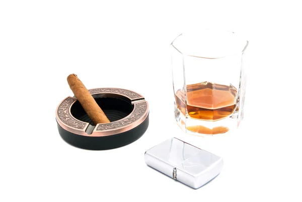 Cigar in ashtray, cognac and lighter on white — Stock Photo, Image
