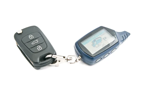 Car keys and alarm system on white — Stock Photo, Image