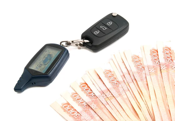 Rubles banknotes and car alarm — Stock Photo, Image