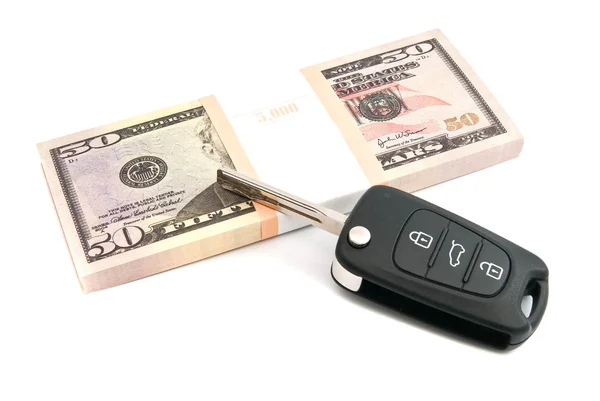 Pack of fifty dollars banknotes and car keys — Stock Photo, Image