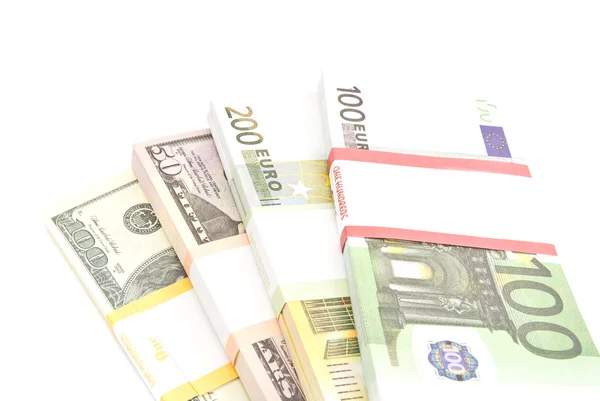 Cuatro paquetes de euros y billetes de dólares —  Fotos de Stock
