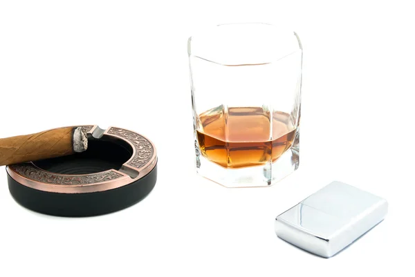Cigar in ashtray, lighter and cognac — Stock Photo, Image