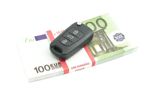 Száz euró bankjegy- és autós kulcsok Stock Kép