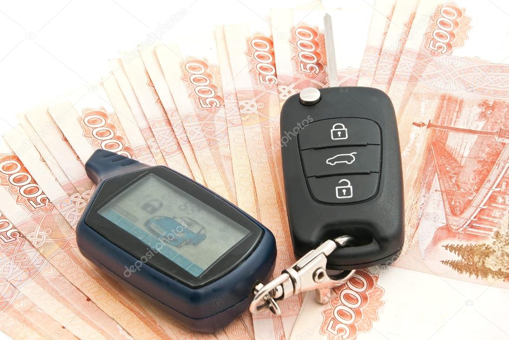 Russian rubles banknotes and car alarm