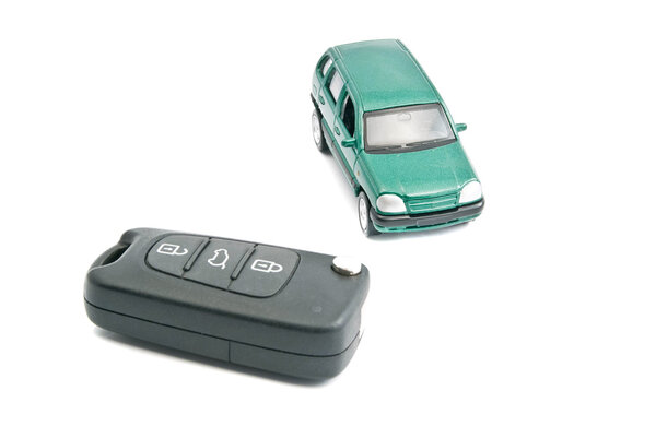 car keys with alarm and green car 