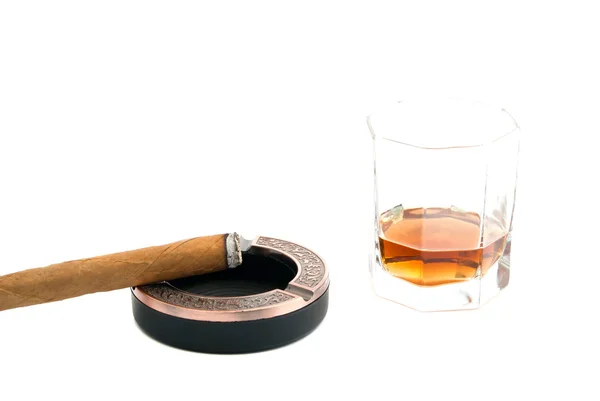 Cigar in ashtray and whiskey on white — Stock Photo, Image