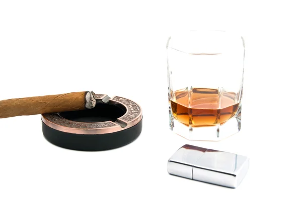 Cigar in ashtray, lighter and whiskey on white — Stock Photo, Image