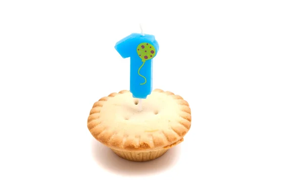 Cupcake with one years birthday candle — Stock Photo, Image