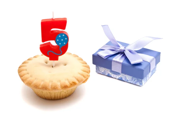 Five years birthday candle with cupcake on white — Stock Photo, Image