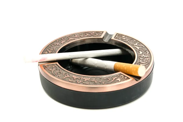 Different cigarettes in metal ashtray — Stock Photo, Image