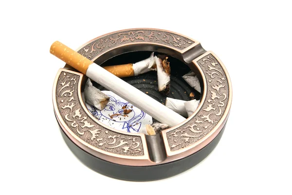 Ashtray with butts and portrait of child on white — Stock Photo, Image