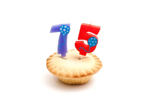 Cupcake met vijfenzeventig jaar verjaardag kaars — Stockfoto