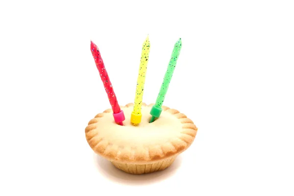 Cupcake with three birthday candles — Stock Photo, Image