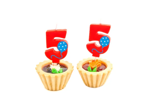 Cakes with fifty five years birthday candles — Stock Photo, Image