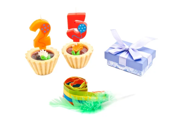 Cakes with twenty five years birthday candles, whistle and gift — Stock Photo, Image