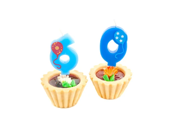 Cakes with sixty years birthday candles — Stock Photo, Image