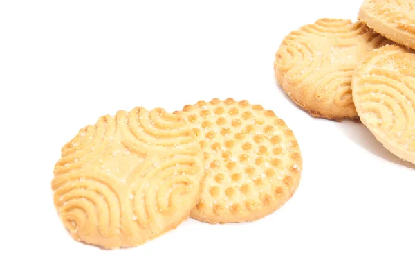 Alguns deliciosos biscoitos em branco — Fotografia de Stock
