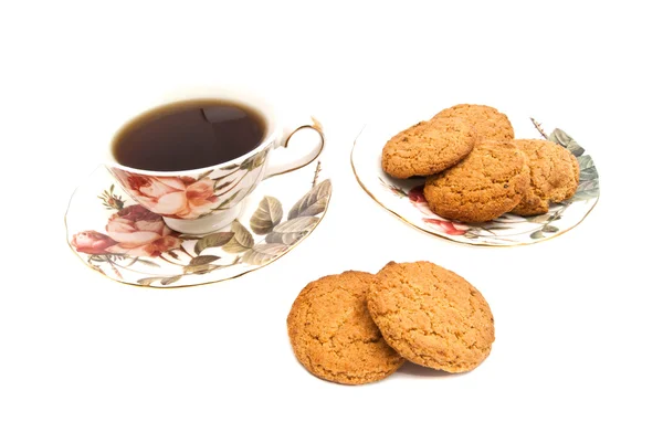 一杯の紅茶とオートミールのクッキー — ストック写真