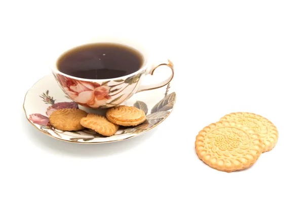 Caneca de chá e diferentes cookies — Fotografia de Stock
