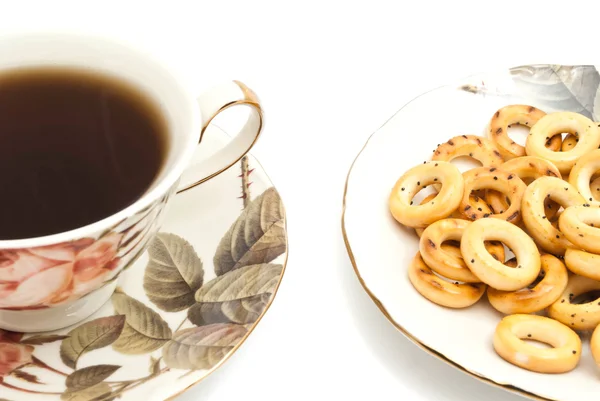 Tazza di tè e gustosi bagel — Foto Stock