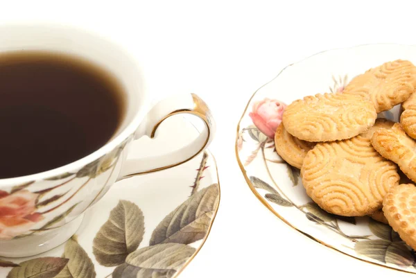 Xícara de chá e biscoitos — Fotografia de Stock