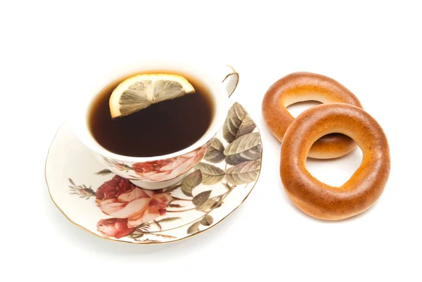 Tee mit Zitrone und zwei Bagels — Stockfoto