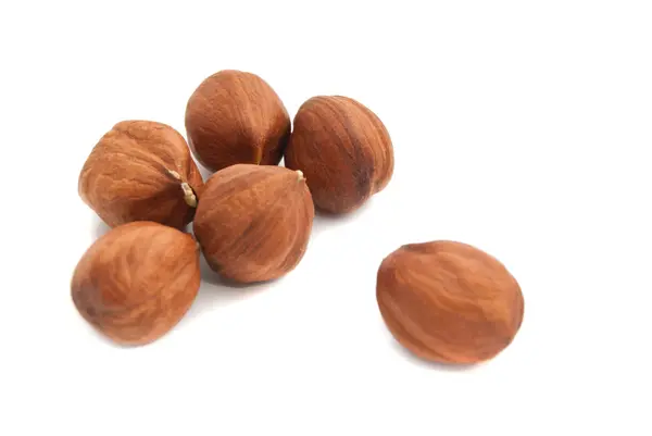 Six hazelnuts on white — Stock Photo, Image