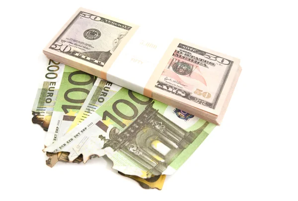 Dollars and burned euros — Stock Photo, Image