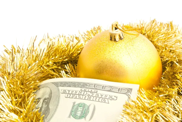 Juguete árbol de navidad, oropel de oro y billetes Imagen De Stock