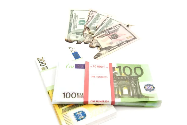 Euros and burned dollars bills — Stock Photo, Image