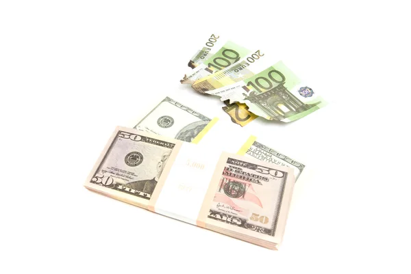 Burned euros and pack of dollars — Stock Photo, Image