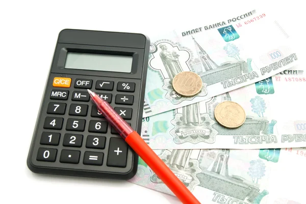 Banknotes, calculator and red pen — Stock Photo, Image