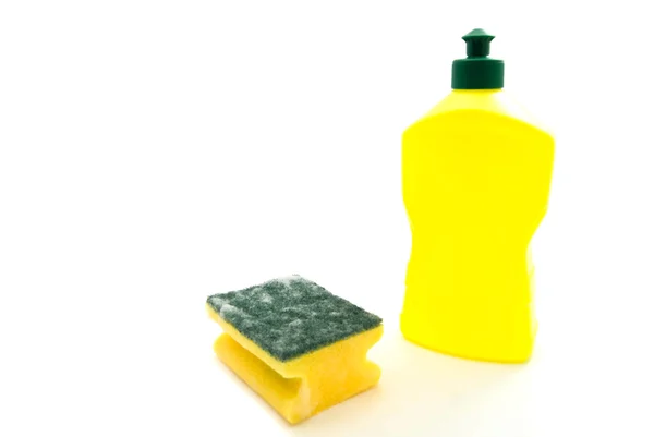 Gąbka z pianki i butelki z detergentem — Zdjęcie stockowe